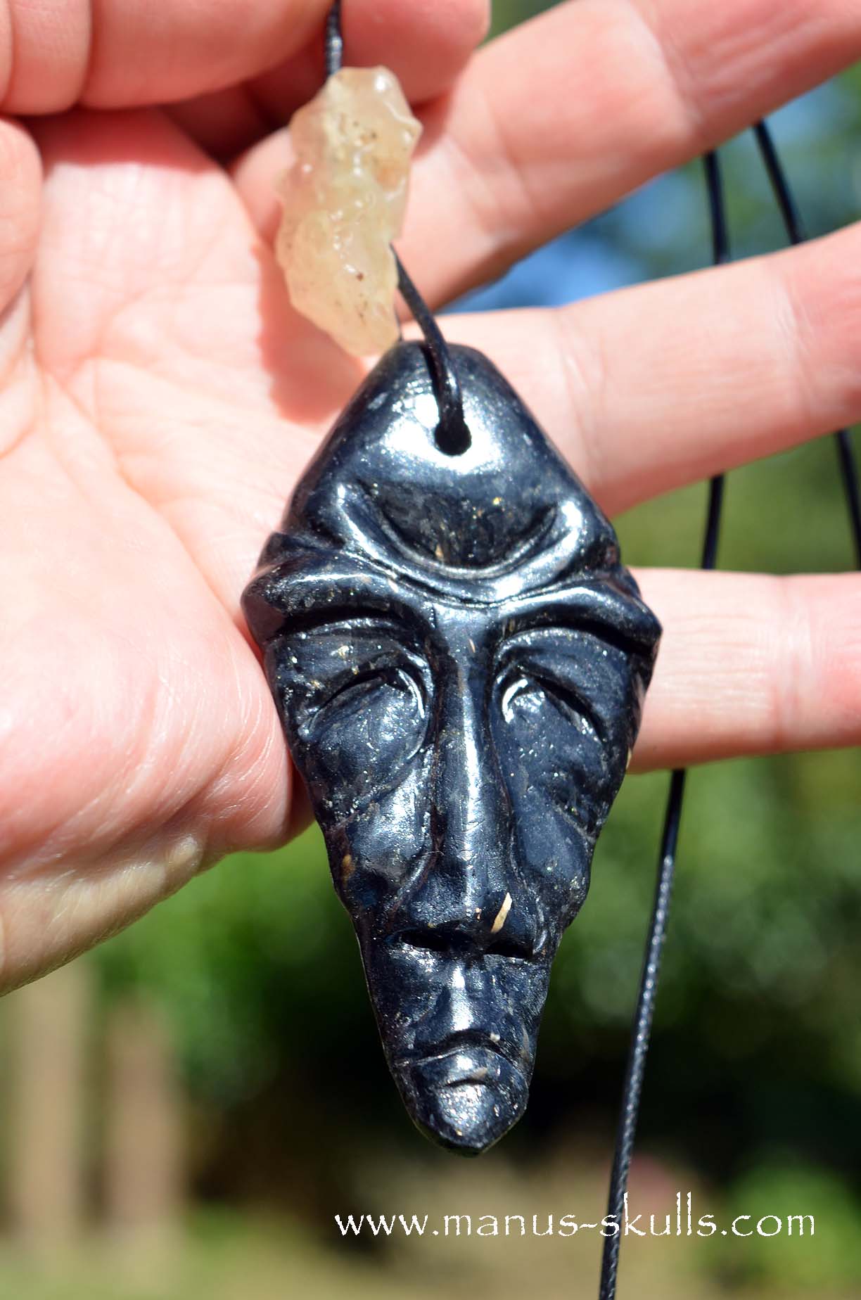 Manus skulls unique Crystal Carvings handmade skulls dragons pendants preseli bluestone tribals spiritual meaning wand Unicorn ..  nuummite libyan desert glass