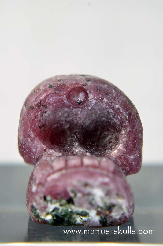 Manus skulls unique Crystal Carvings handmade skulls dragons pendants preseli bluestone tribals spiritual meaning wand Unicorn .. ruby