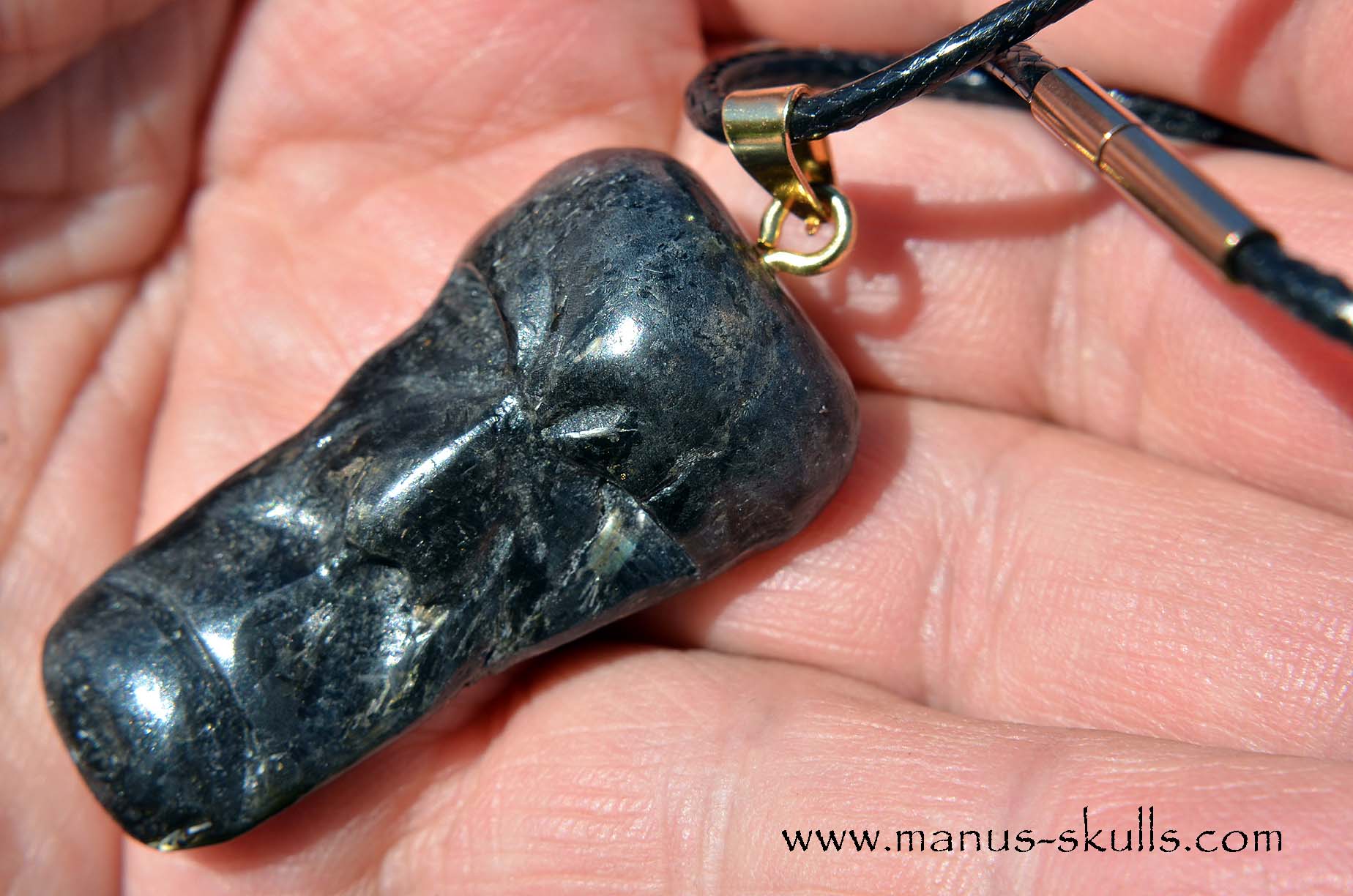 Manus skulls unique Crystal Carvings handmade skulls dragons pendants preseli bluestone tribals spiritual meaning .. nuummite