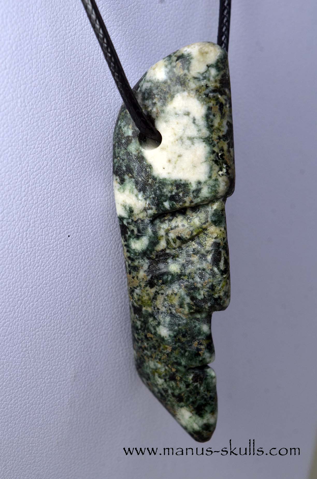 Manus skulls unique Crystal Carvings handmade skulls dragons pendants preseli bluestone tribals spiritual meaning ..