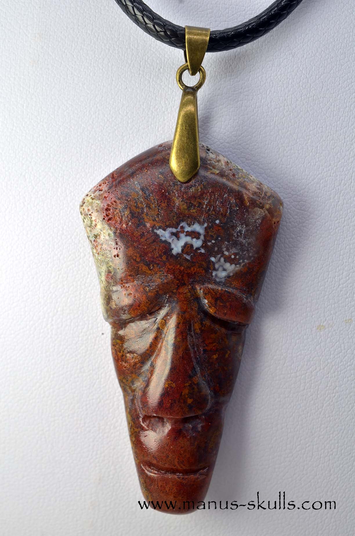 Manus skulls unique Crystal Carvings handmade skulls dragons pendants preseli bluestone tribals spiritual meaning .. red moss agate