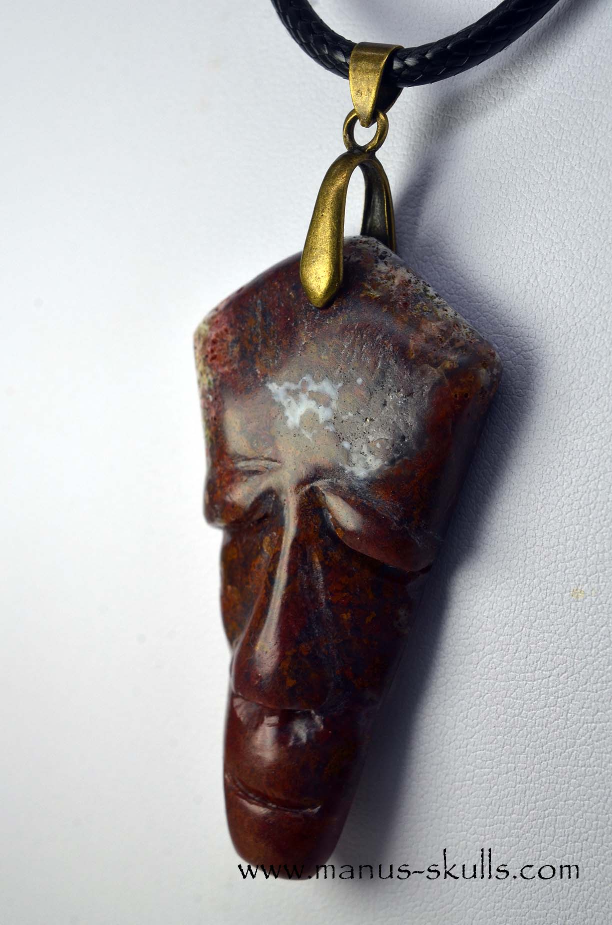 Manus skulls unique Crystal Carvings handmade skulls dragons pendants preseli bluestone tribals spiritual meaning .. red moss agate