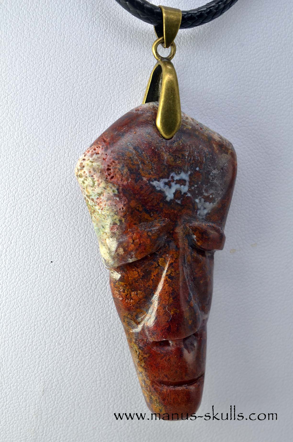 Manus skulls unique Crystal Carvings handmade skulls dragons pendants preseli bluestone tribals spiritual meaning .. red moss agate