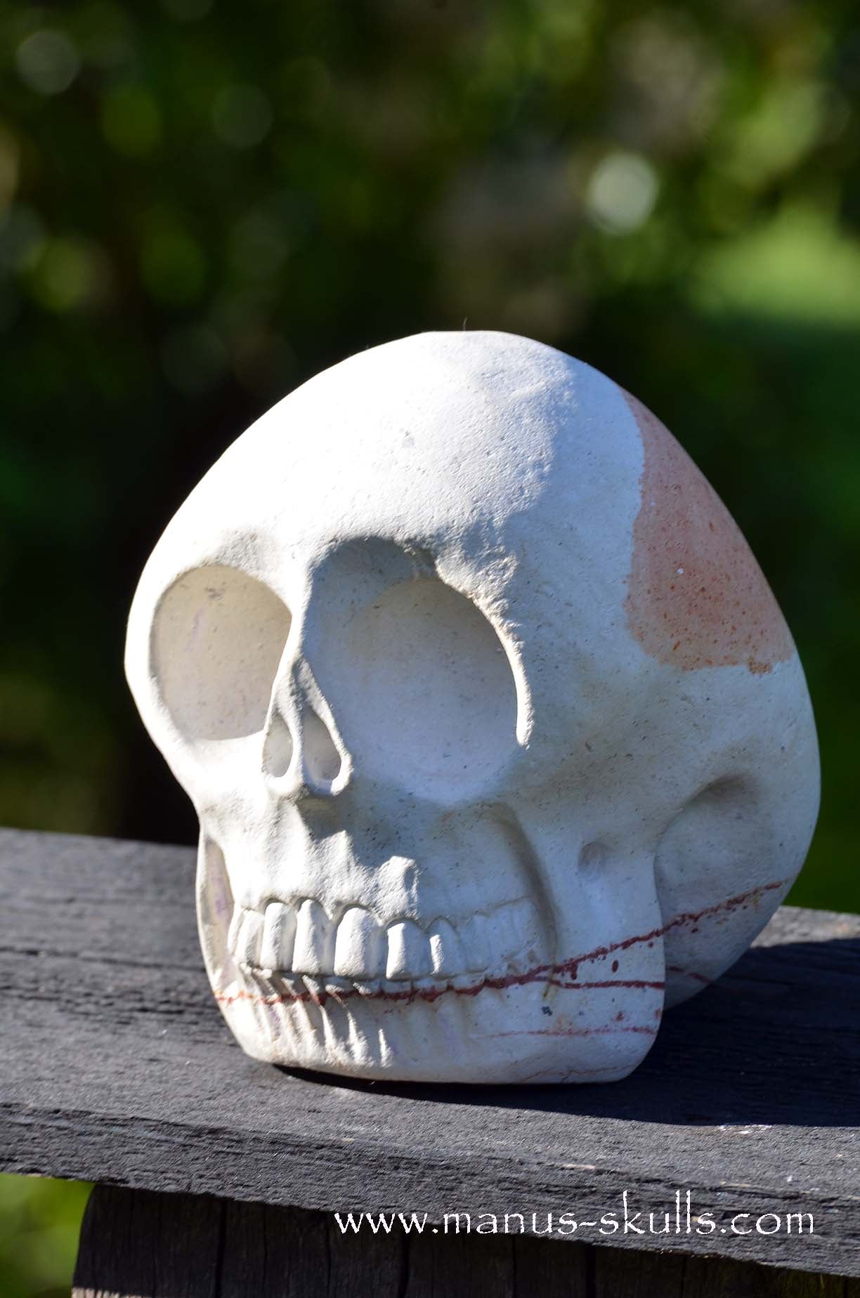 Manus skulls unique Crystal Carvings handmade skulls dragons pendants preseli bluestone tribals spiritual meaning  Arizona Sandstone Manus Skull