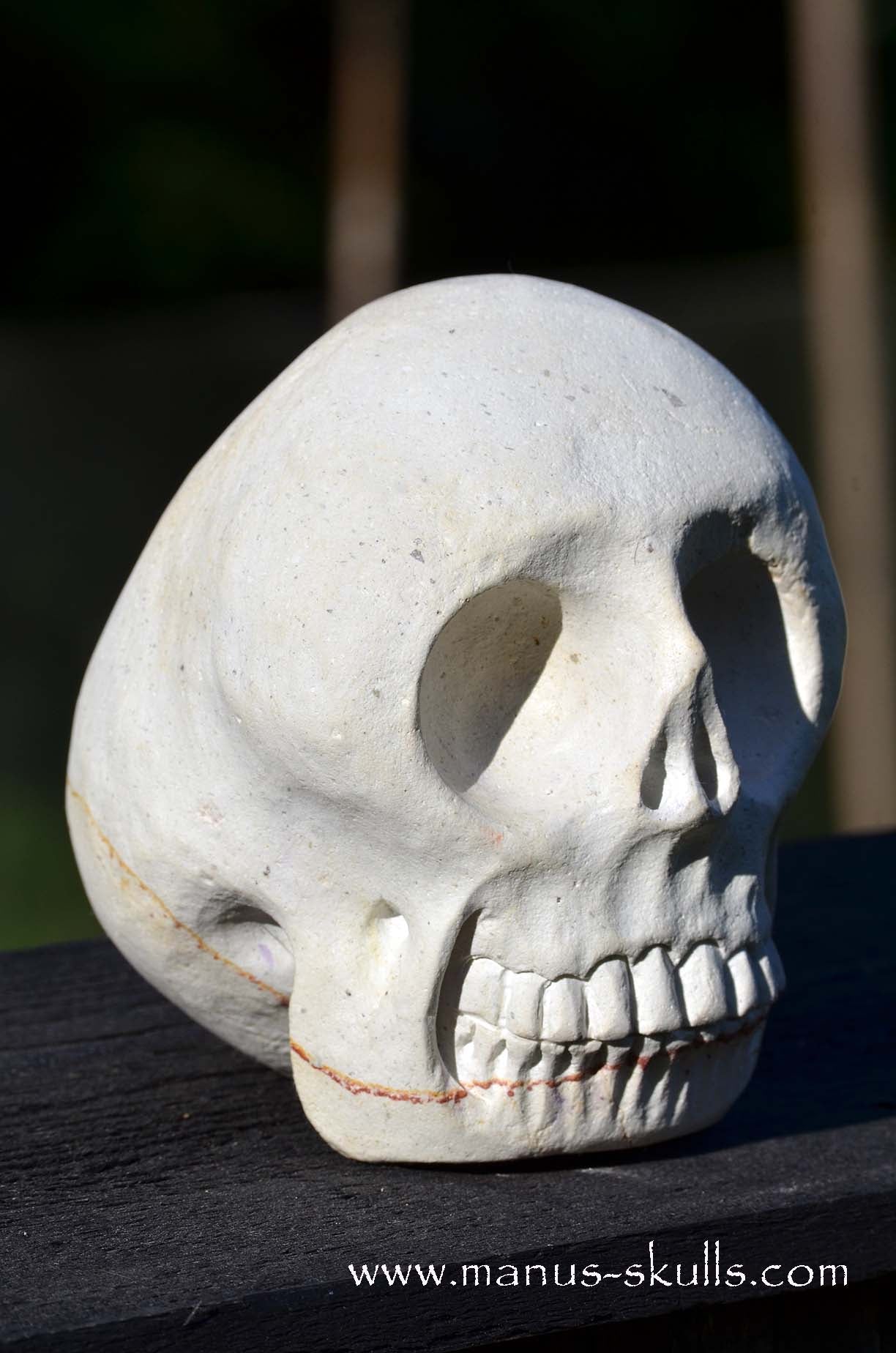 Manus skulls unique Crystal Carvings handmade skulls dragons pendants preseli bluestone tribals spiritual meaning  Arizona Sandstone Manus Skull