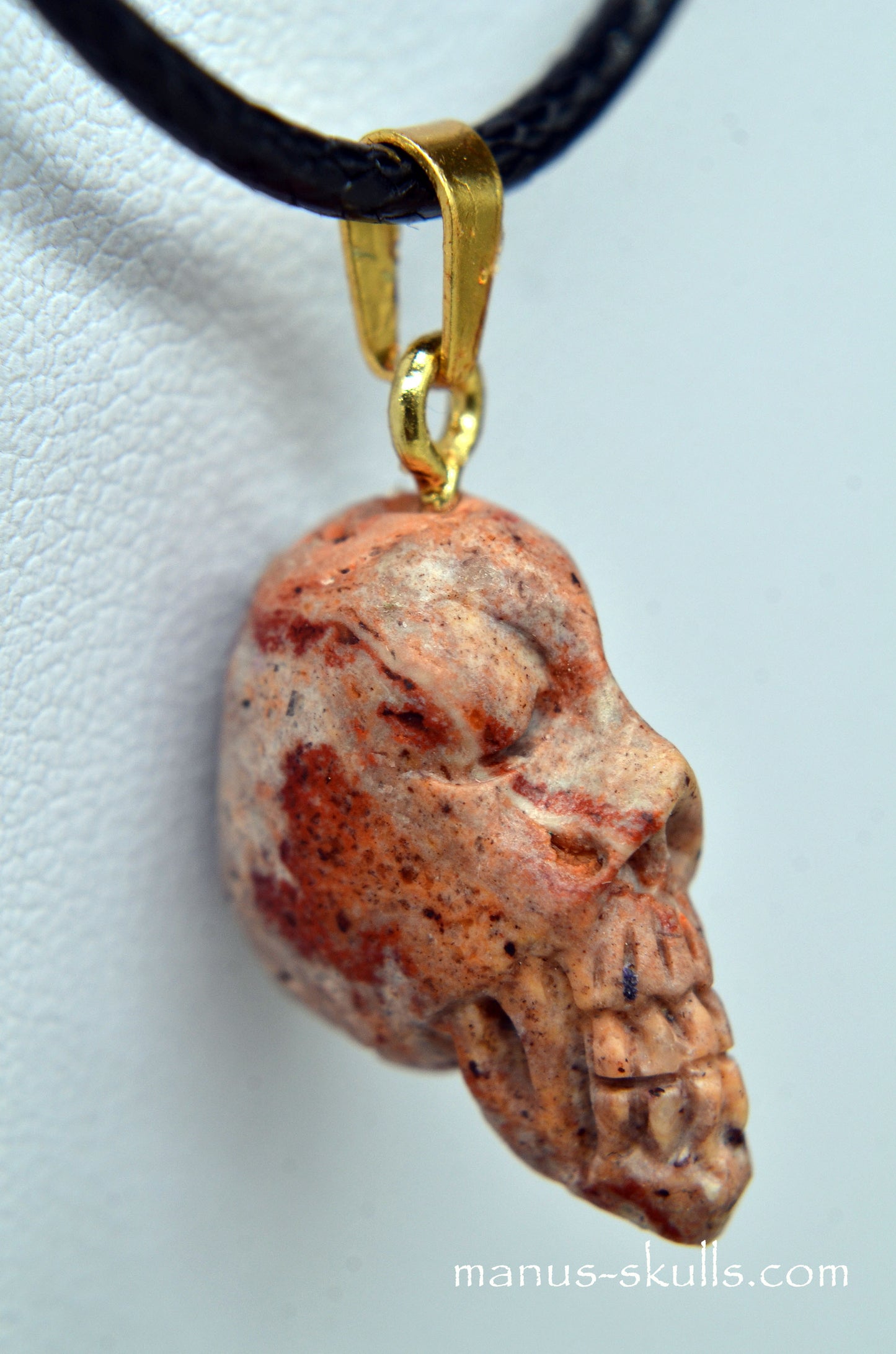 Fire Opal Skull Pendant.