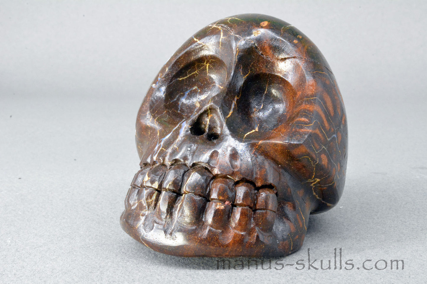 Australian Boulder Opal Manus Skull. Boulder Opal Manus Skull.