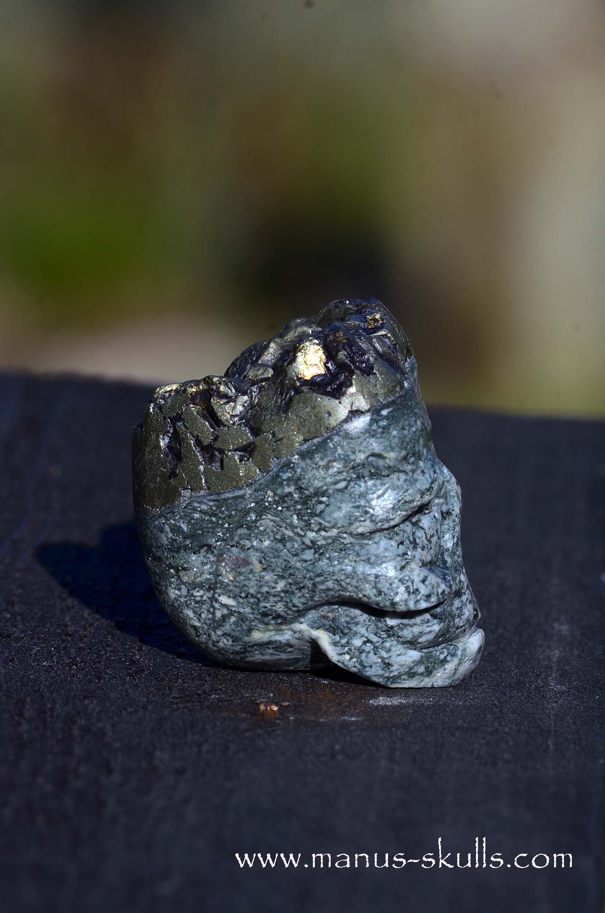 Manus skulls unique Crystal Carvings handmade skulls dragons pendants preseli bluestone tribals spiritual meaning .. Bornite peacock ore