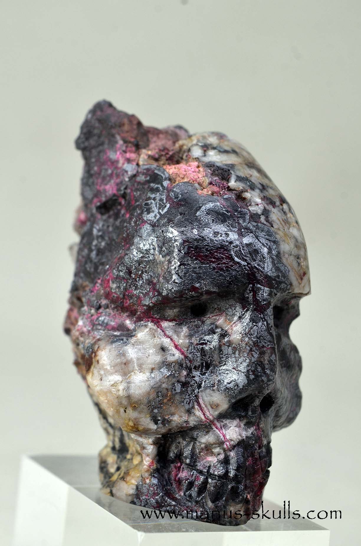 Manus skulls unique Crystal Carvings handmade skulls dragons pendants preseli bluestone tribals spiritual meaning .. Erythrite