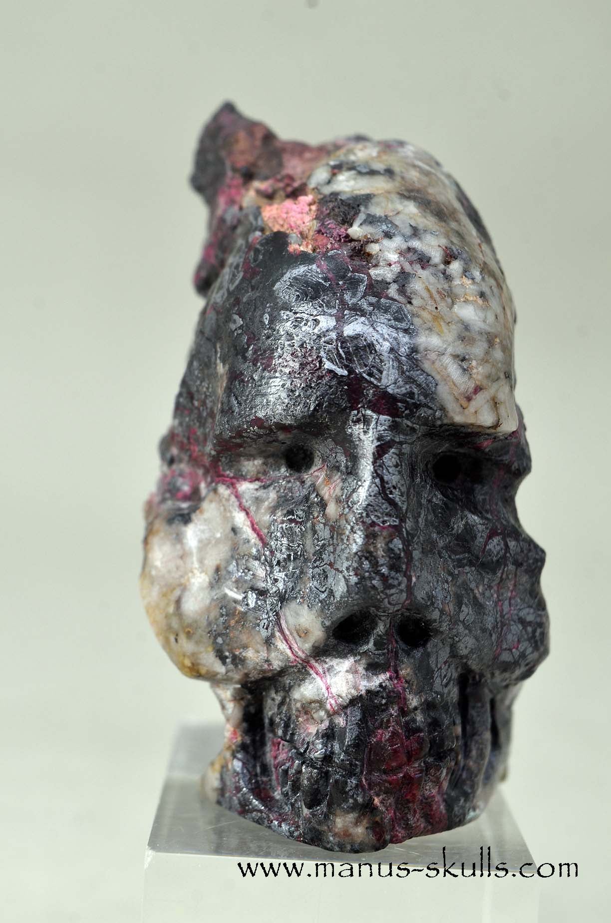 Manus skulls unique Crystal Carvings handmade skulls dragons pendants preseli bluestone tribals spiritual meaning .. Erythrite