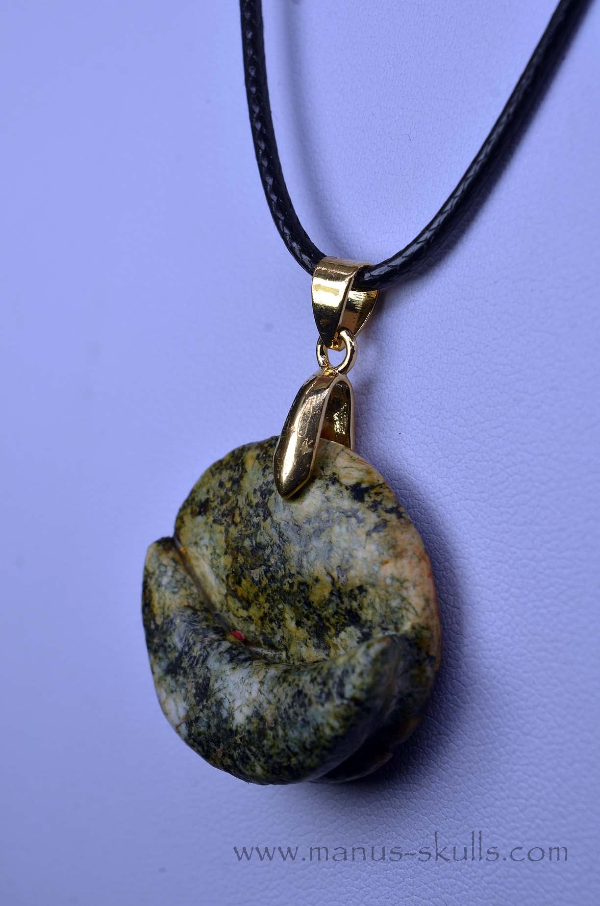 Manus skulls unique Crystal Carvings handmade skulls dragons pendants preseli bluestone tribals spiritual meaning wand Unicorn .. half moon