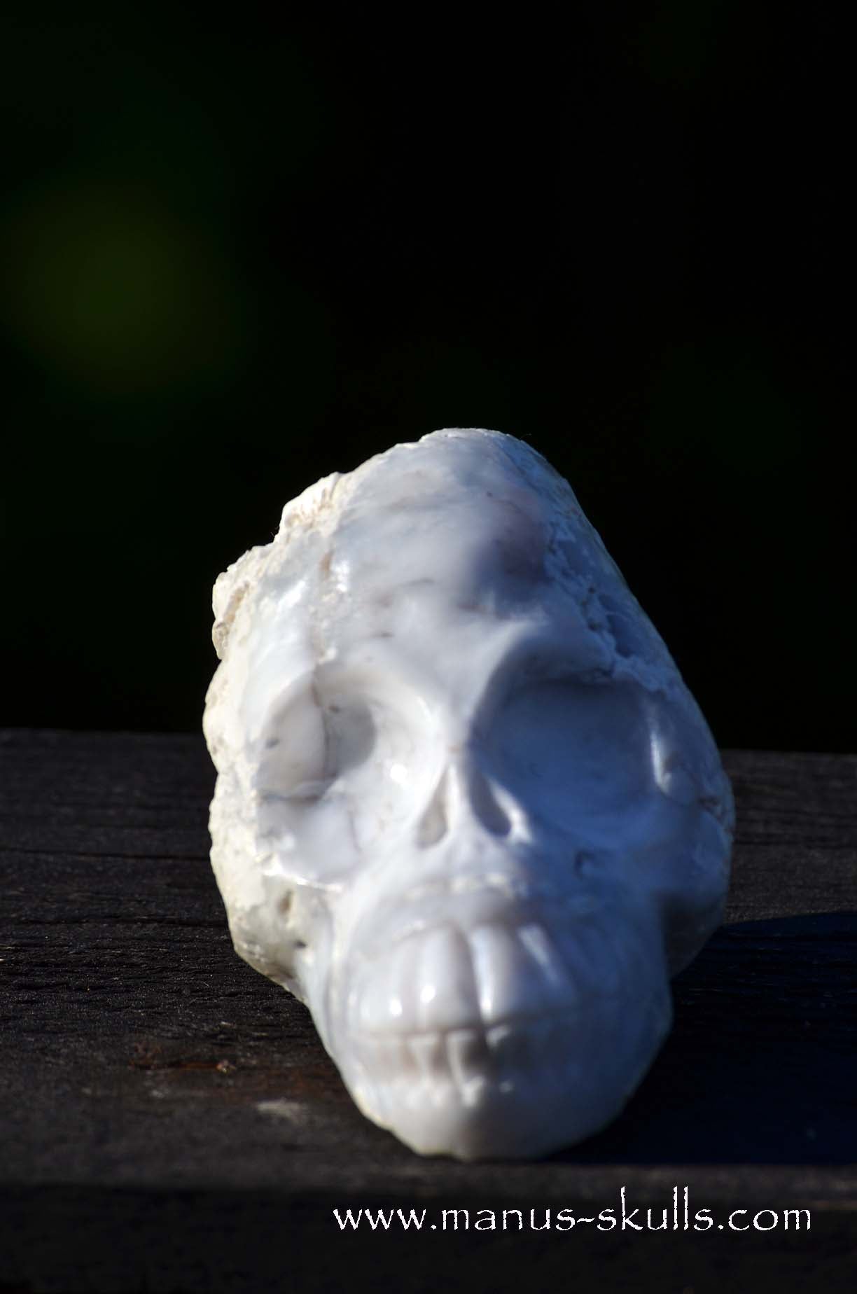 Manus skulls unique Crystal Carvings handmade skulls dragons pendants preseli bluestone tribals spiritual meaning Cacholong Opal Milk