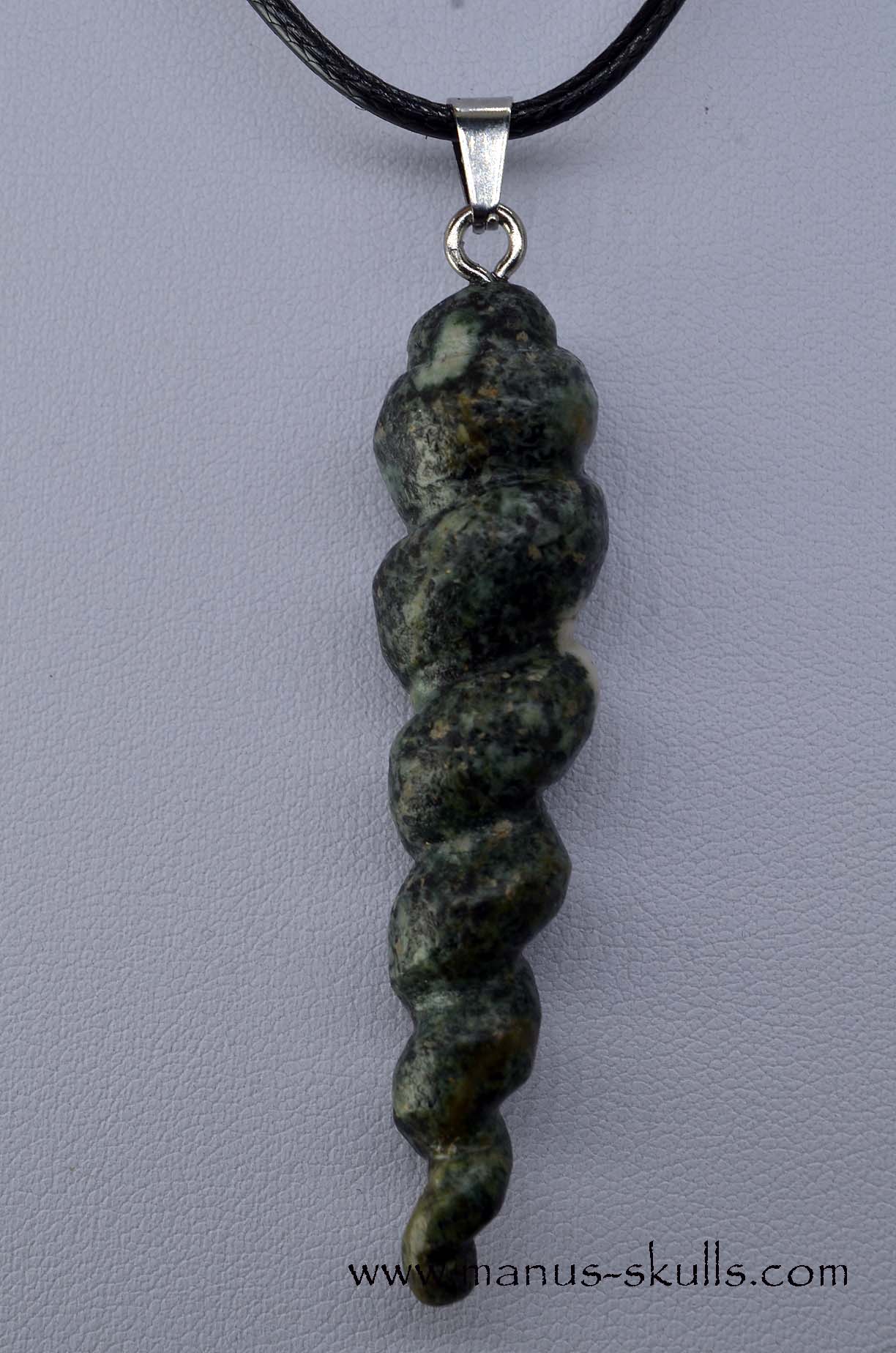 This is a very special PRESELI BLUESTONE Unicorn Horn Alicorn Pendant ...... completely handmade. Can also be used as a wand or pendulum! Manus skulls unique Crystal Carvings handmade skulls dragons pendants preseli bluestone tribals spiritual meaning ..