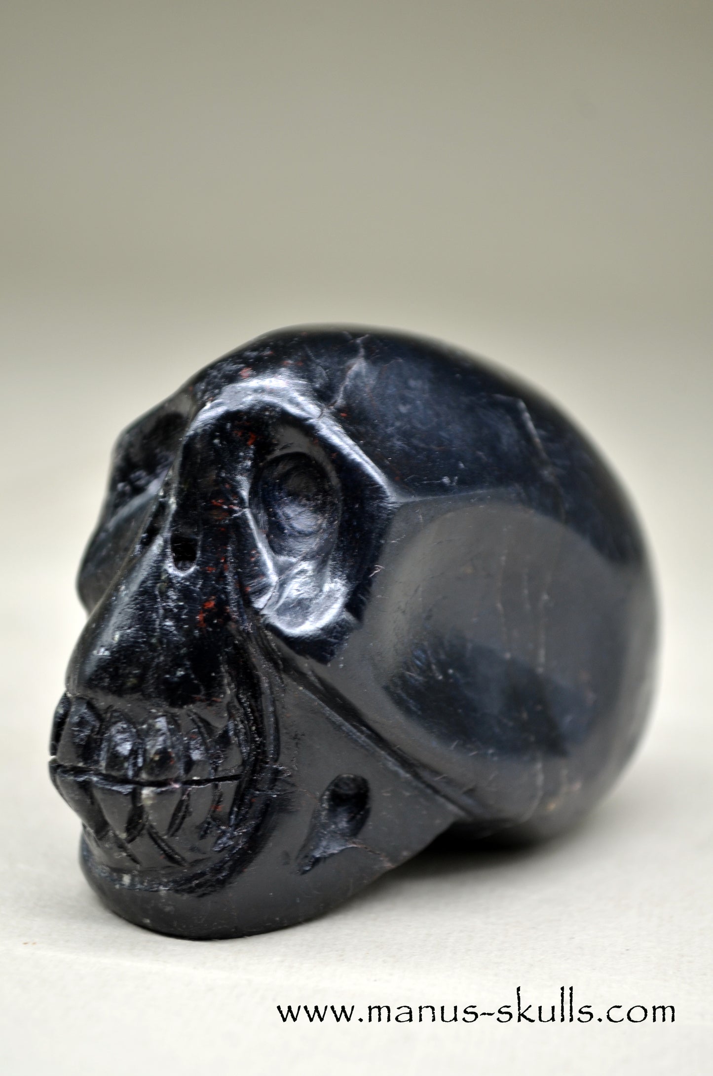 Black Tourmaline Manus Skull