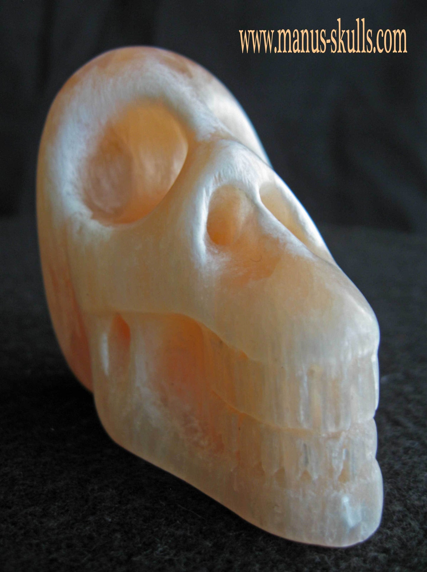 Peach Selenite Skull