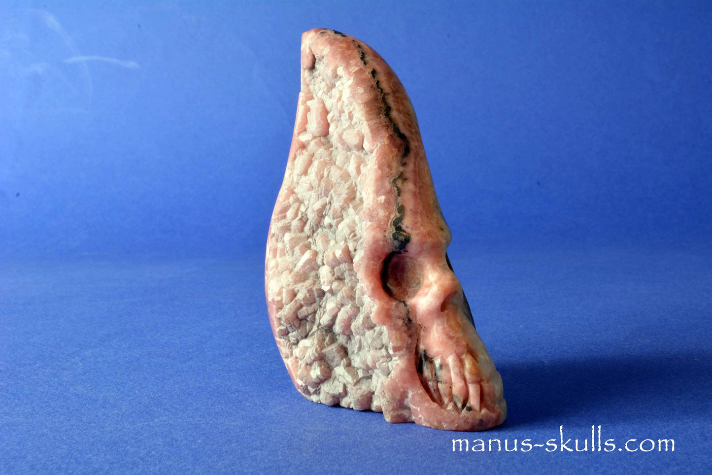 Rhodochrosite Conehead Skull
