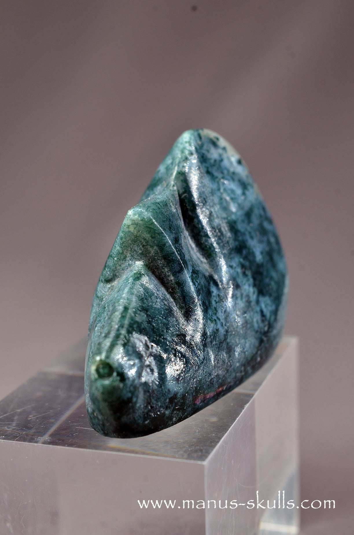 Manus skulls unique Crystal Carvings handmade skulls dragons pendants preseli bluestone tribals spiritual meaning wand Unicorn ..  moss agate whistling skull face