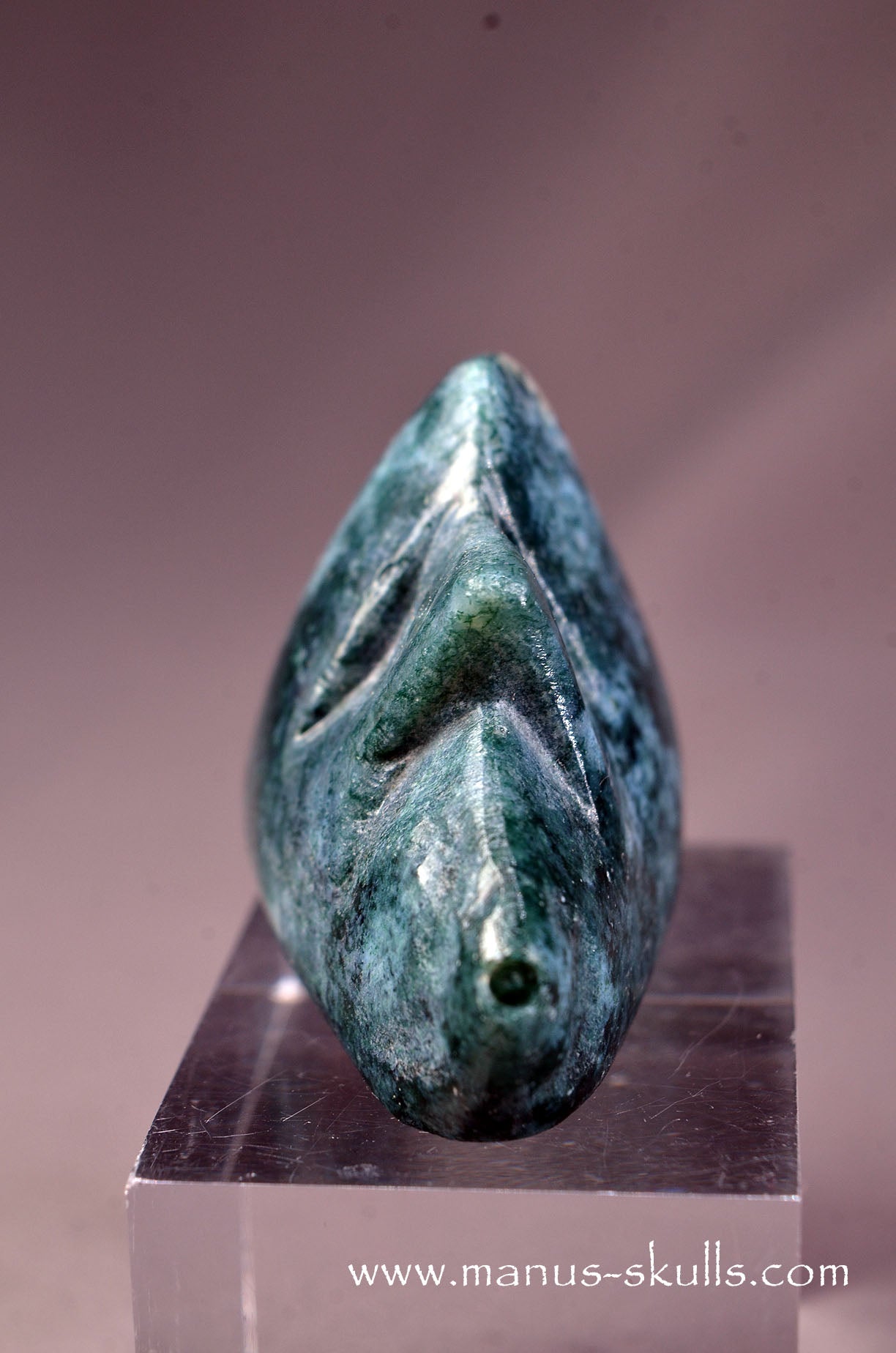 Manus skulls unique Crystal Carvings handmade skulls dragons pendants preseli bluestone tribals spiritual meaning wand Unicorn ..  moss agate whistling skull face