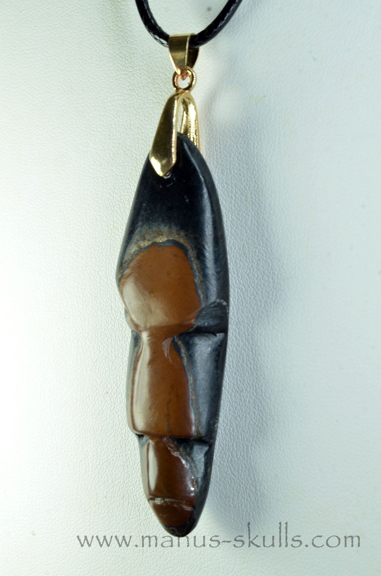 Manus skulls Evolians Dragolians unique Crystal Carvings handmade skulls dragons pendants preseli bluestone tribals spiritual meaning wand Unicorn ..  tiger eye tribal