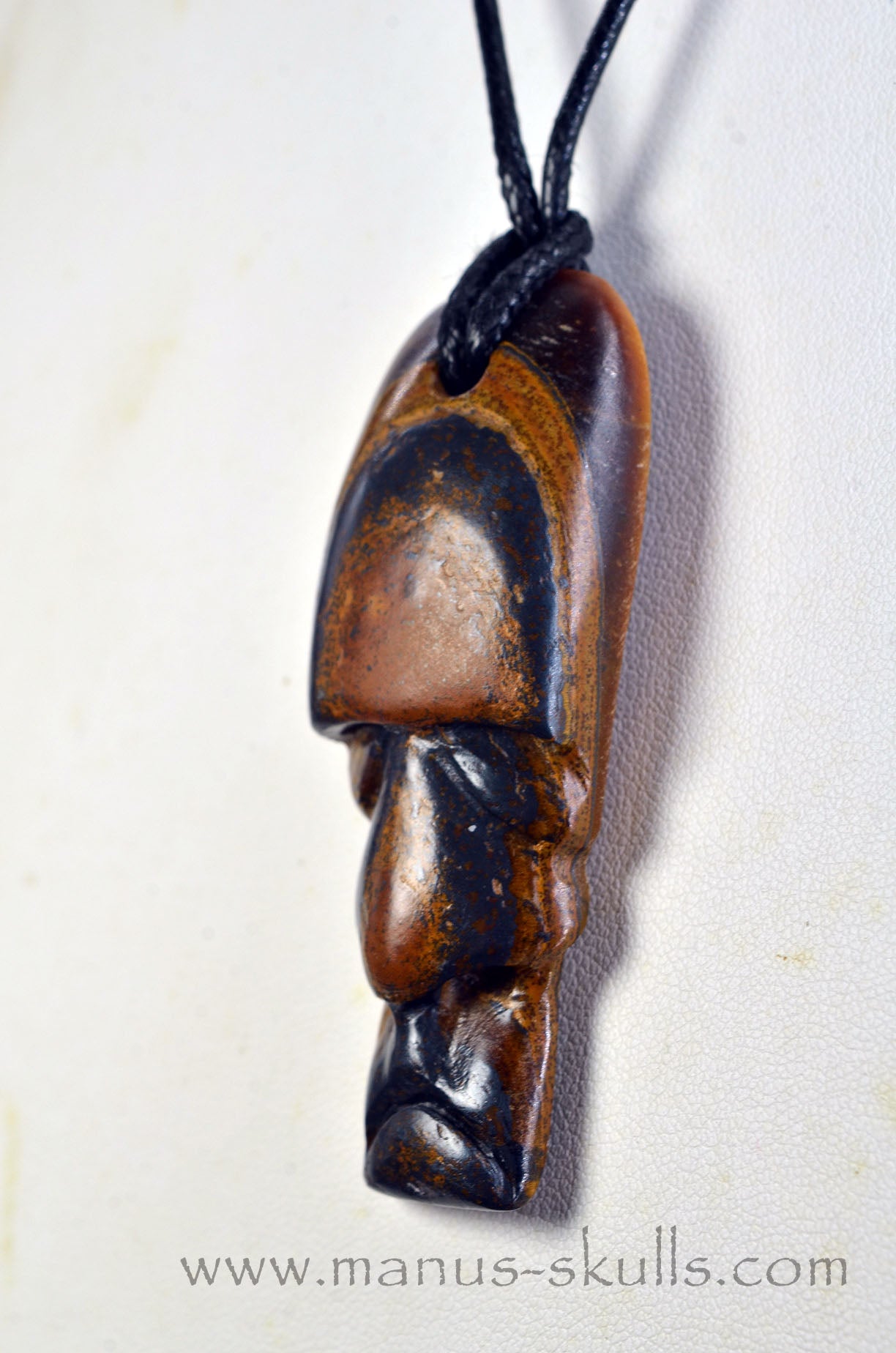 Manus skulls Evolians Dragolians unique Crystal Carvings handmade skulls dragons pendants preseli bluestone tribals spiritual meaning wand Unicorn ..  tribal Tiger Eye
