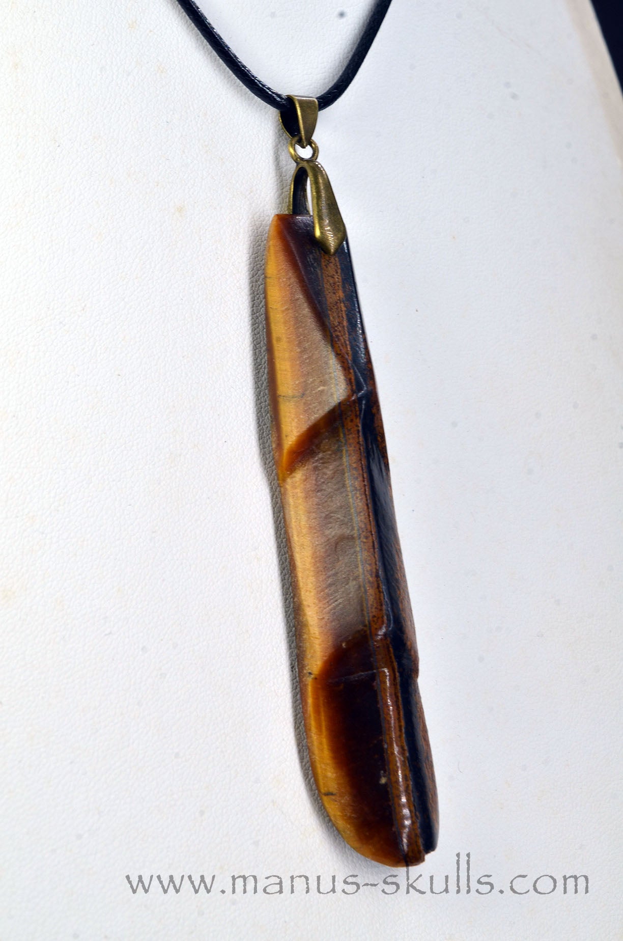 Manus skulls Evolians Dragolians unique Crystal Carvings handmade skulls dragons pendants preseli bluestone tribals spiritual meaning wand Unicorn ..  tiger eye tribal