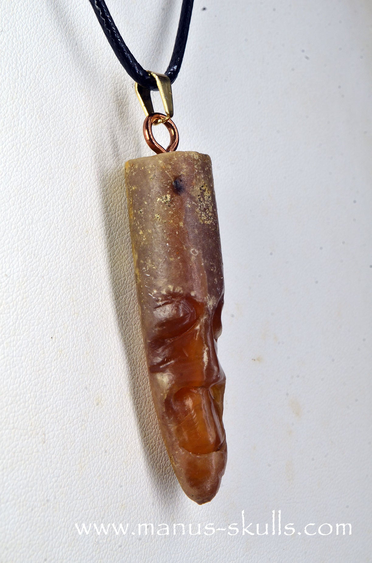 Manus skulls Evolians Dragolians unique Crystal Carvings handmade skulls dragons pendants preseli bluestone tribals spiritual meaning wand Unicorn ..  belemnite