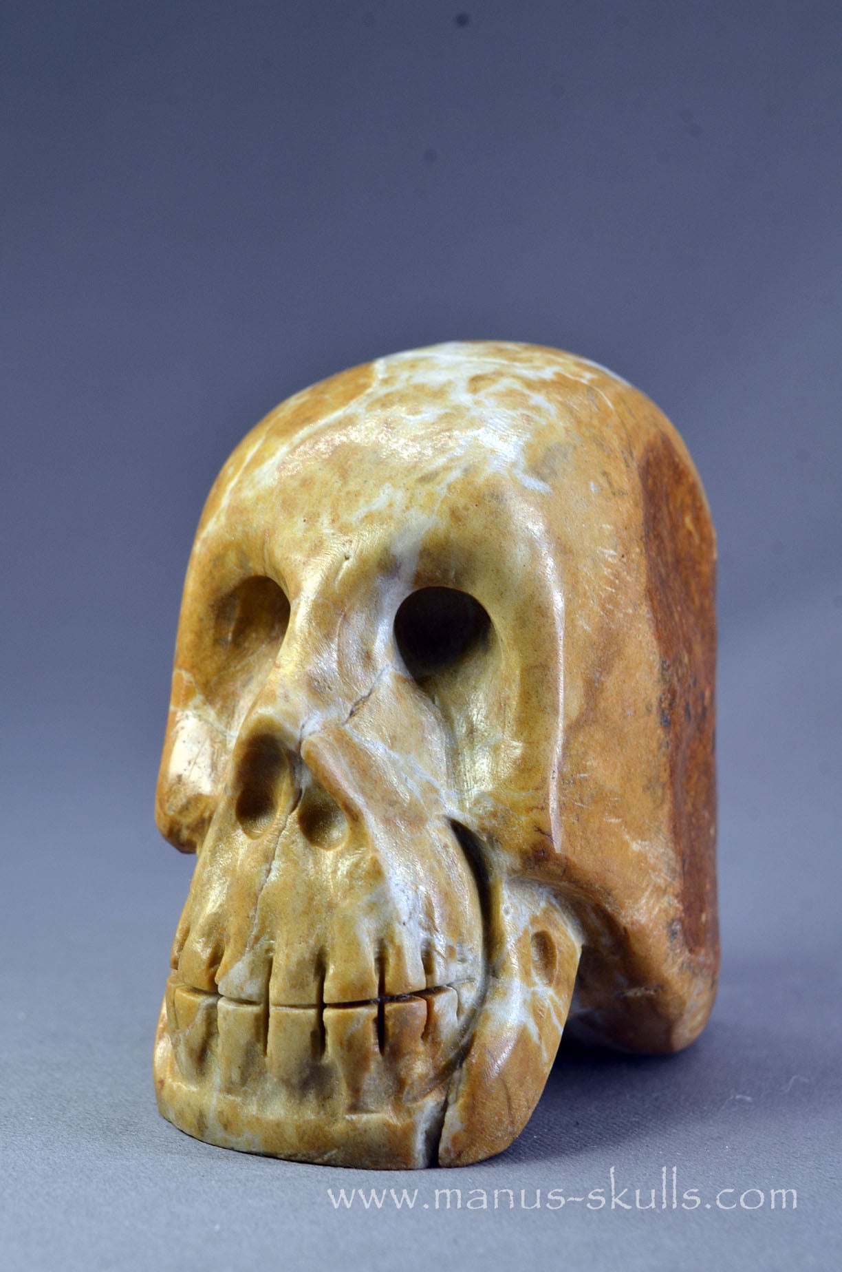 Manus skulls Evolians Dragolians unique Crystal Carvings handmade skulls dragons pendants preseli bluestone tribals spiritual meaning wand Unicorn ..  sarsen stone