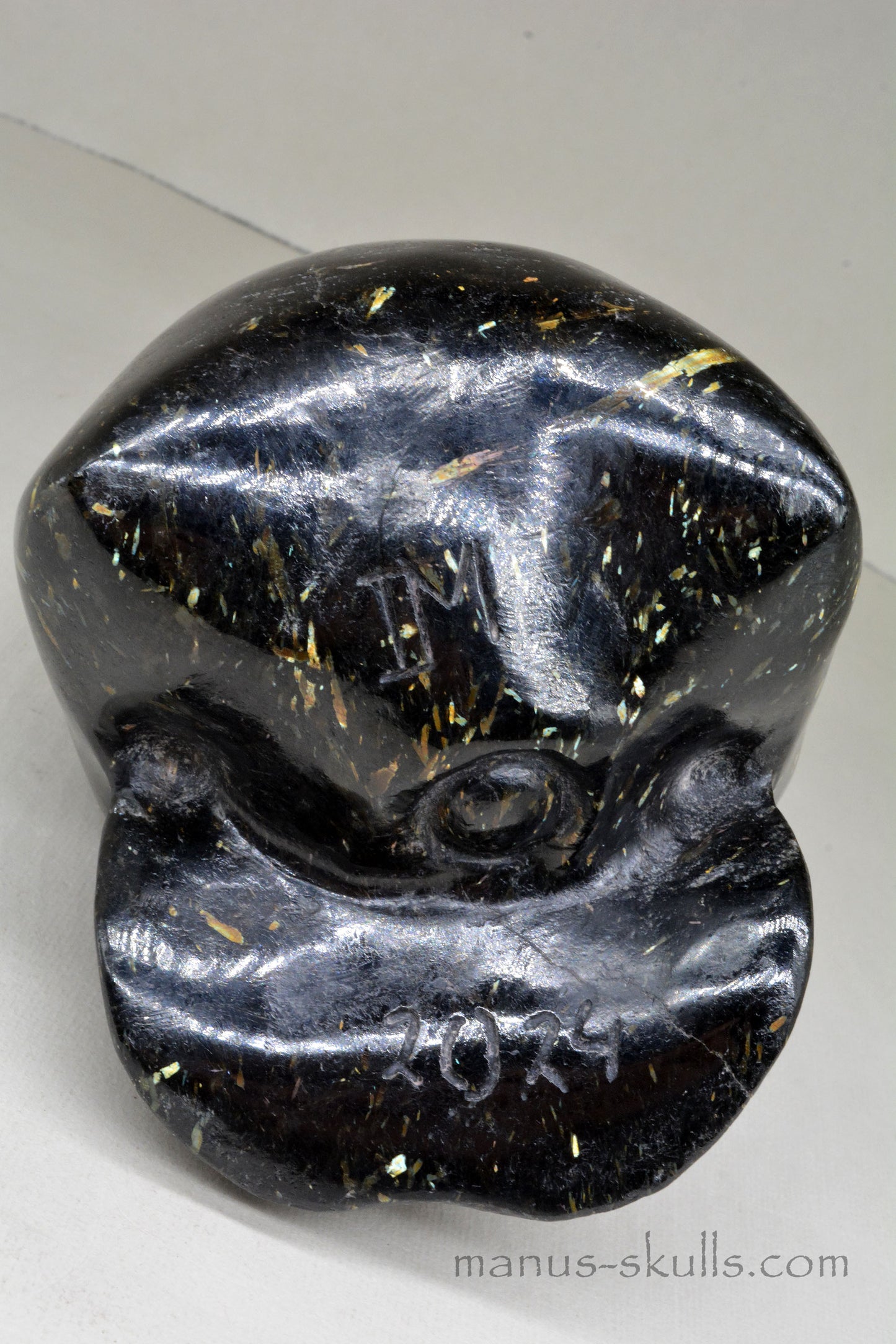 Huge Nuummite Skull ....