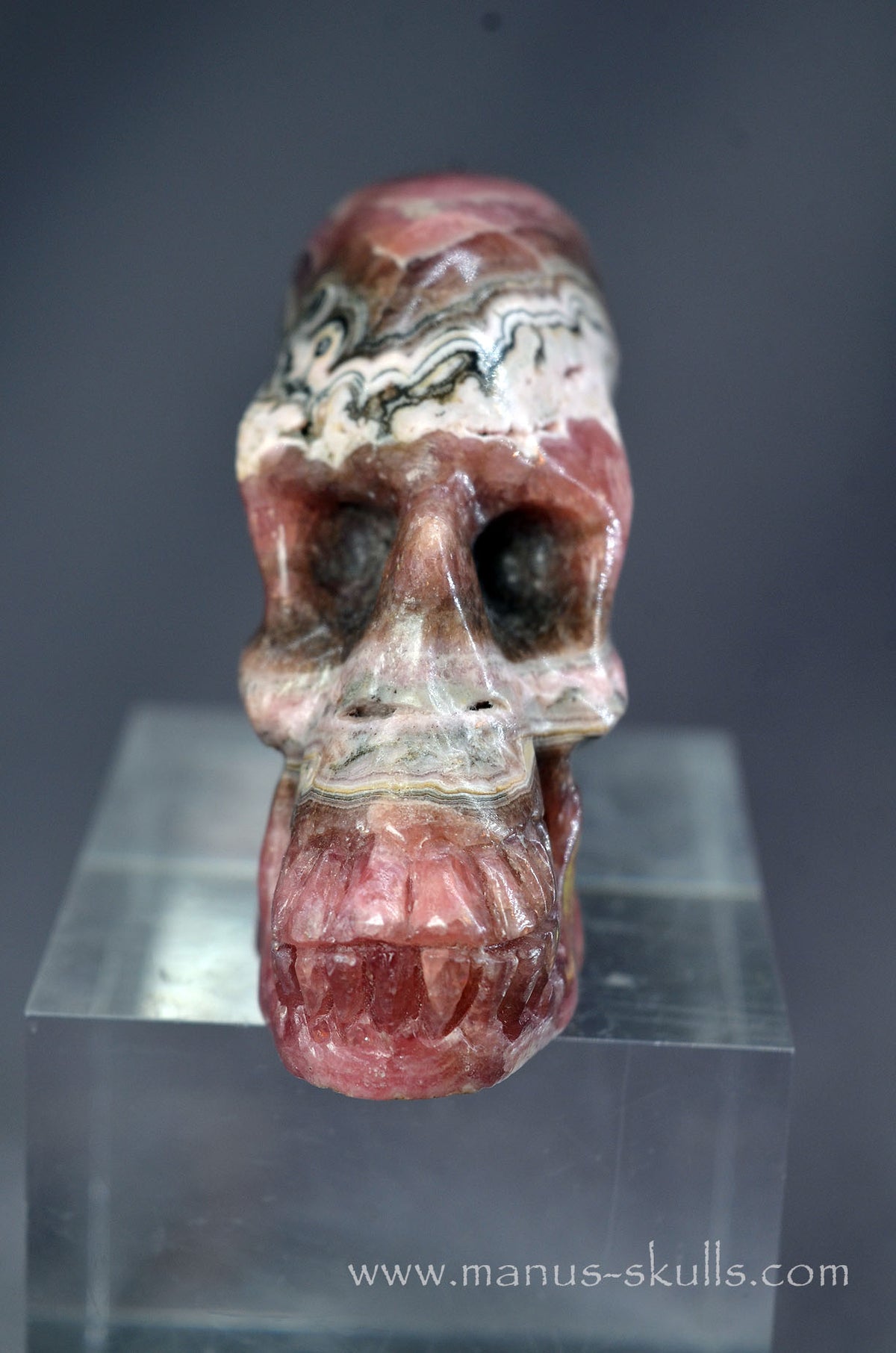 Manus skulls Evolians Dragolians unique Crystal Carvings handmade skulls dragons pendants preseli bluestone tribals spiritual meaning wand Unicorn ..  Rhodochrosite