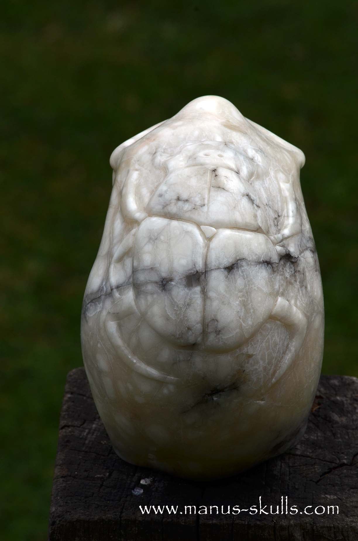 Alabaster Skull with carved Scarab Beetle ....