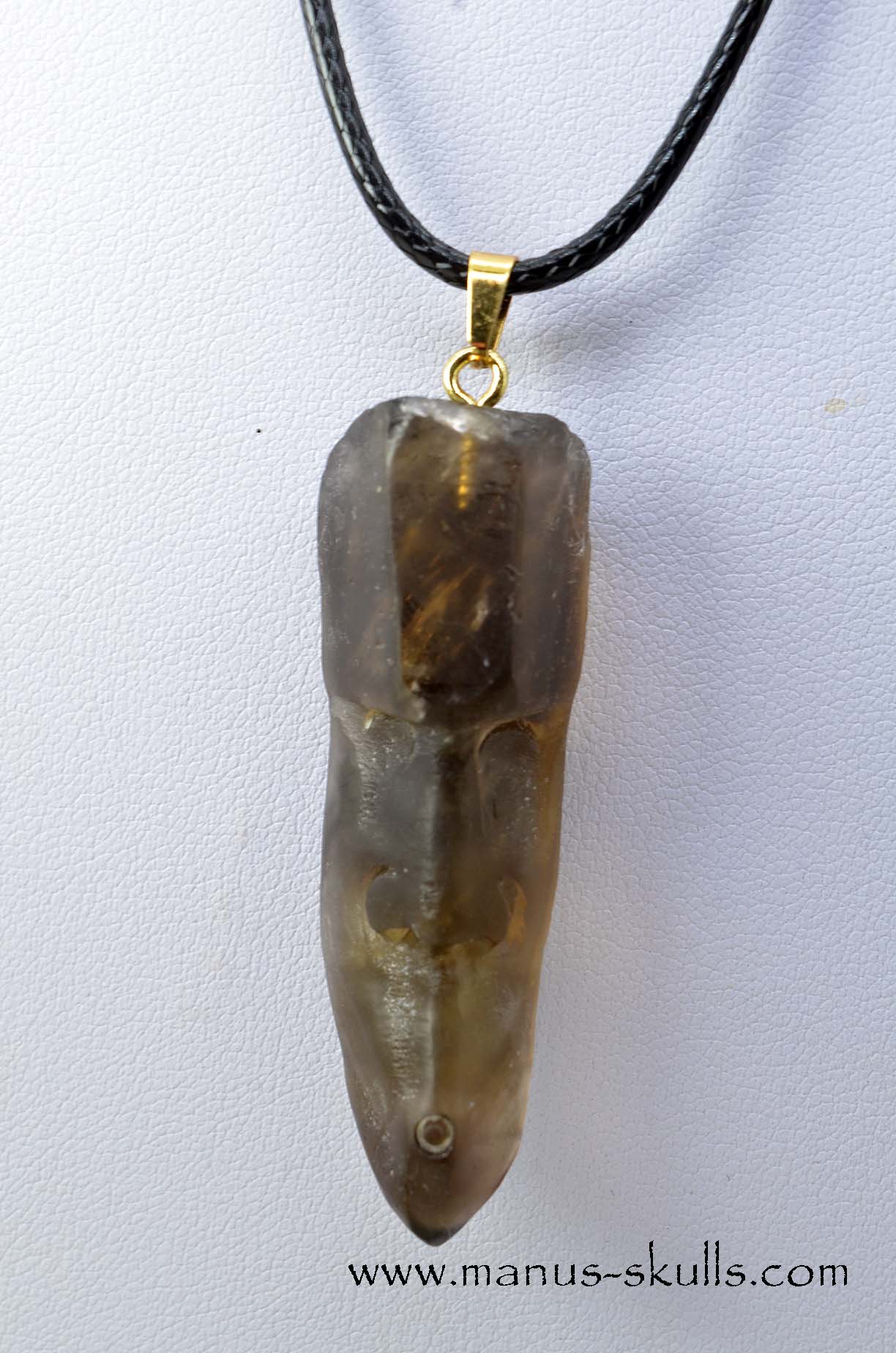 Manus skulls unique Crystal Carvings handmade skulls dragons pendants preseli bluestone tribals spiritual meaning .. whistles smokey quartz