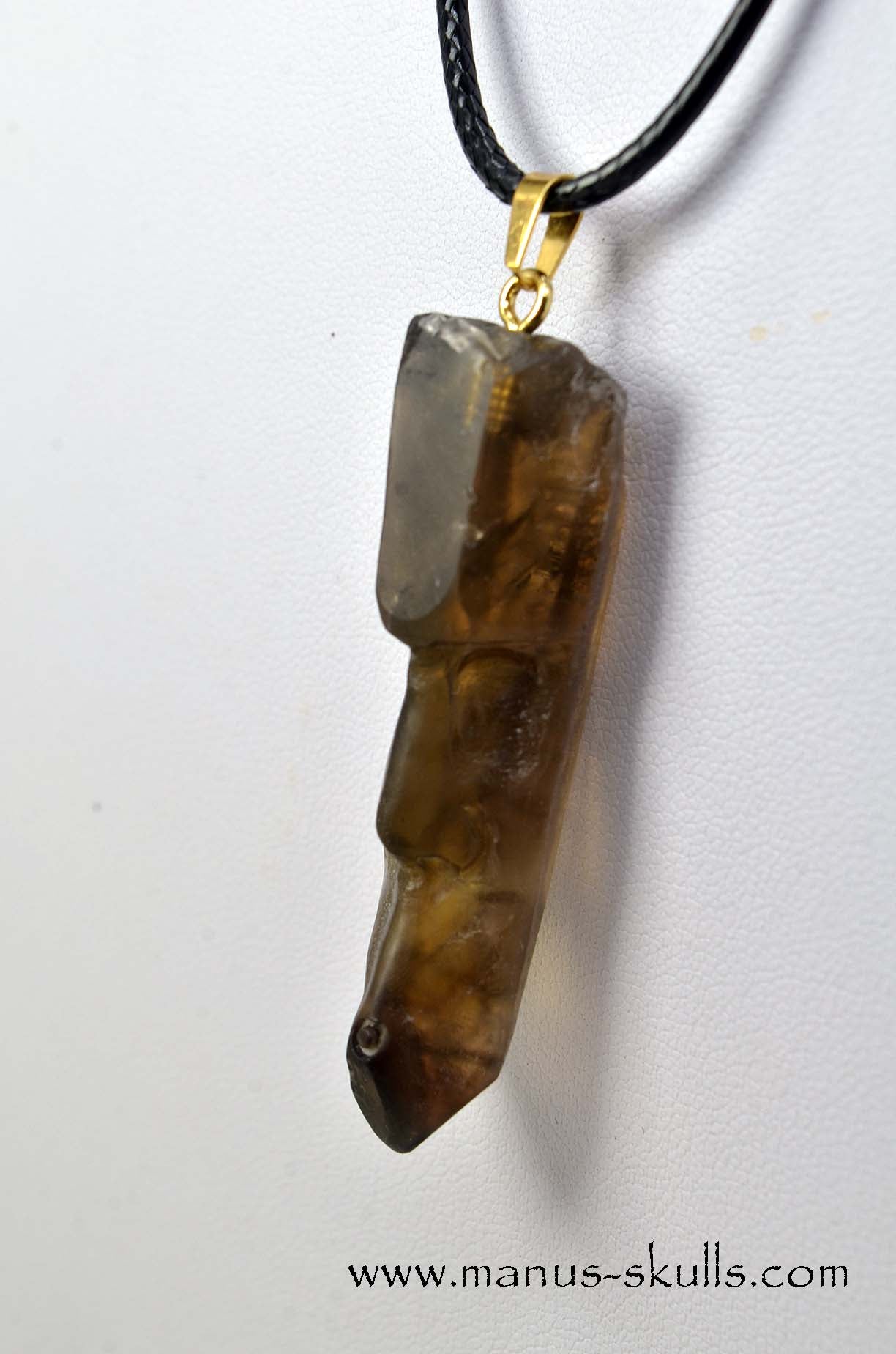 Manus skulls unique Crystal Carvings handmade skulls dragons pendants preseli bluestone tribals spiritual meaning .. whistles smokey quartz