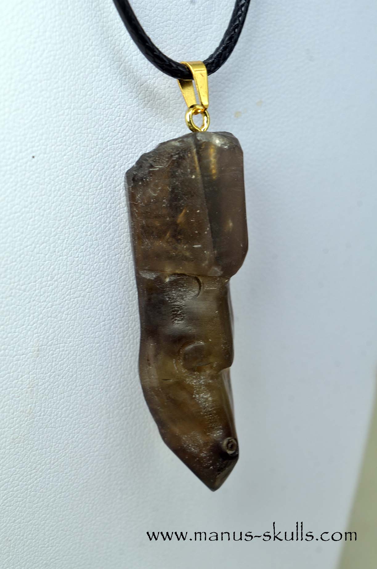 Manus skulls unique Crystal Carvings handmade skulls dragons pendants preseli bluestone tribals spiritual meaning .. whistles smokey quartz