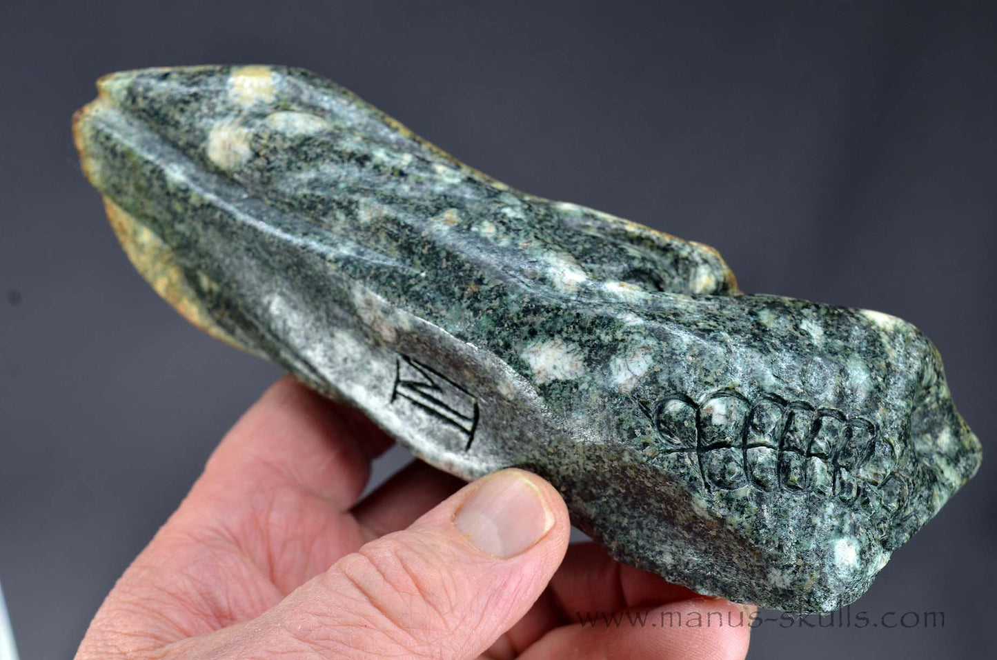Preseli Bluestone Dragon with living moss on top.