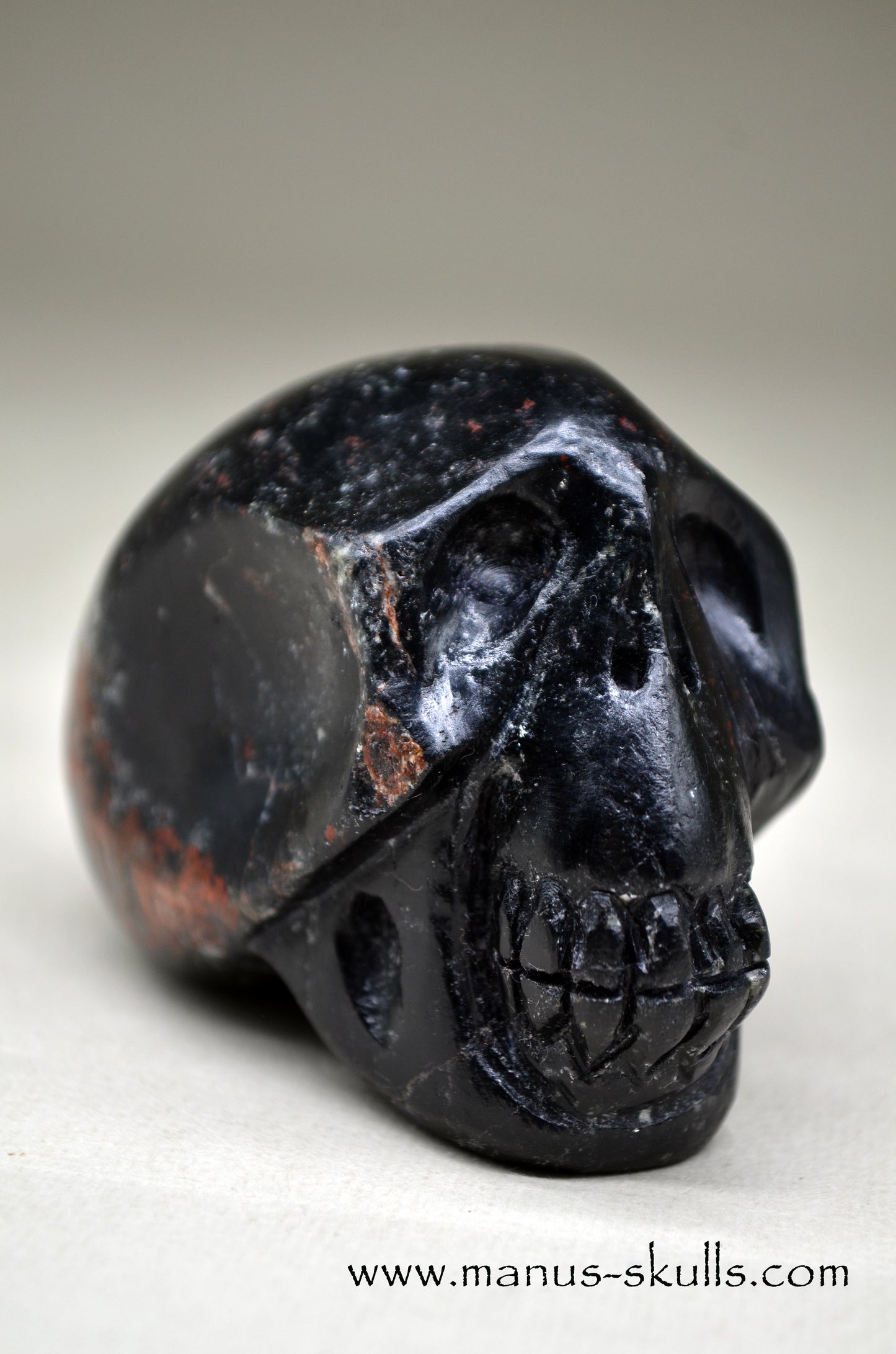 Black Tourmaline Manus Skull