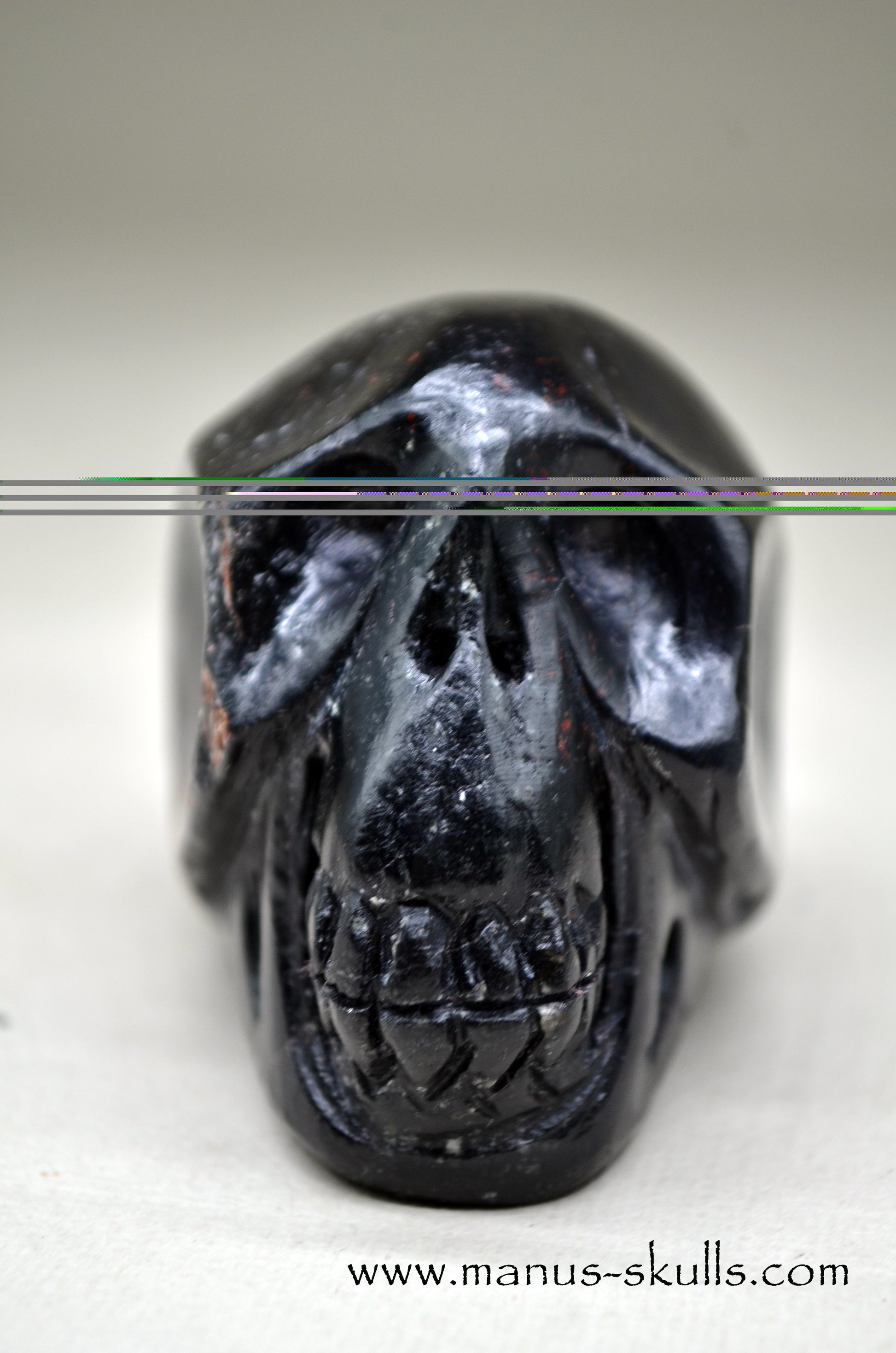 Black Tourmaline Manus Skull