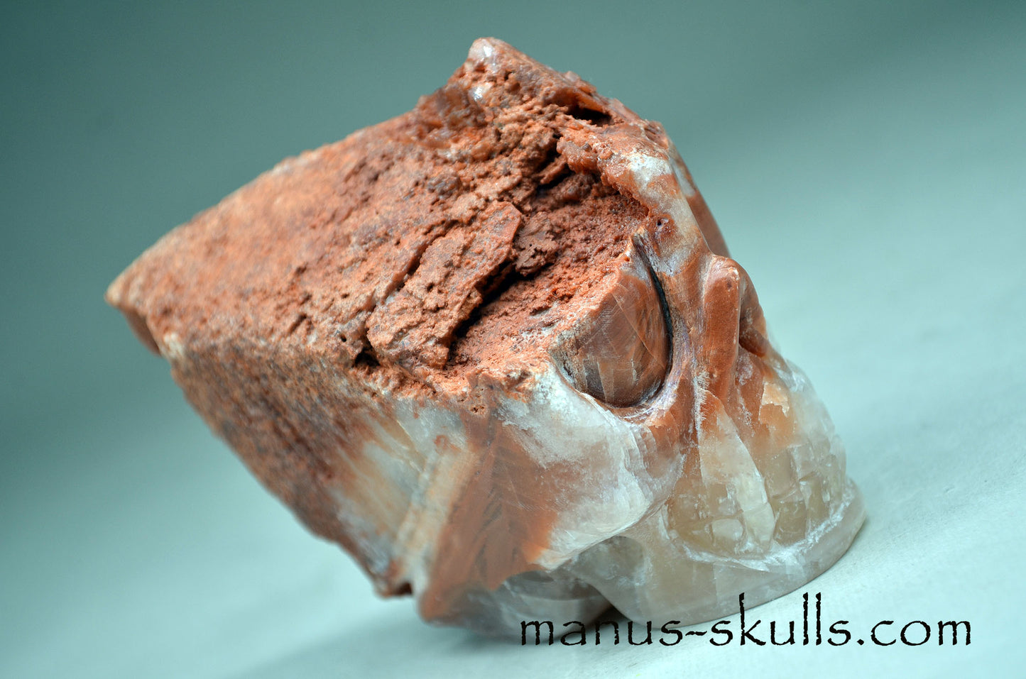 Red Calcite Skull