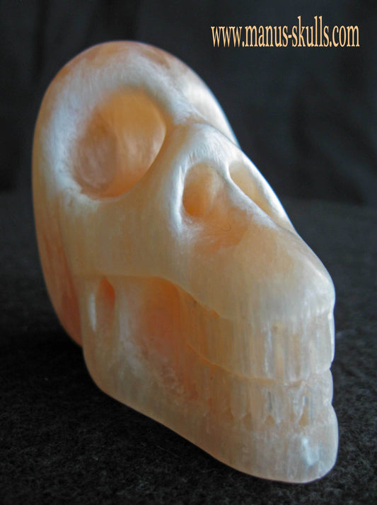 Peach Selenite Skull