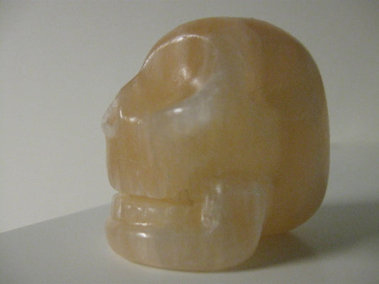 Peach Selenite Skull