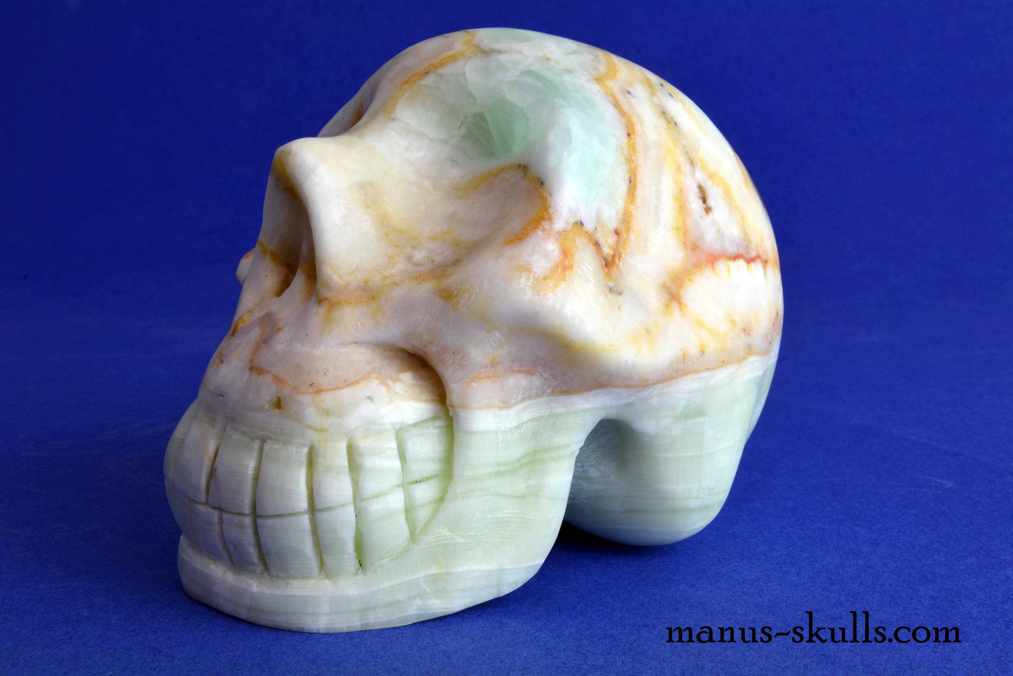 Rainbow Calcite Skull