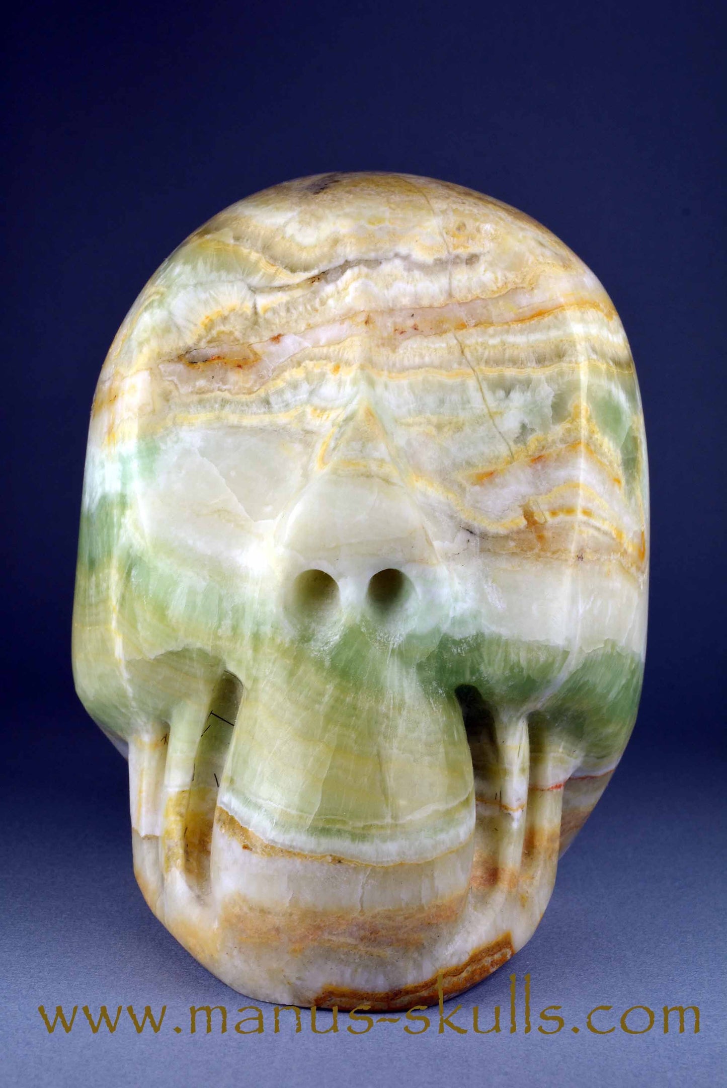 Rainbow Calcite Skull