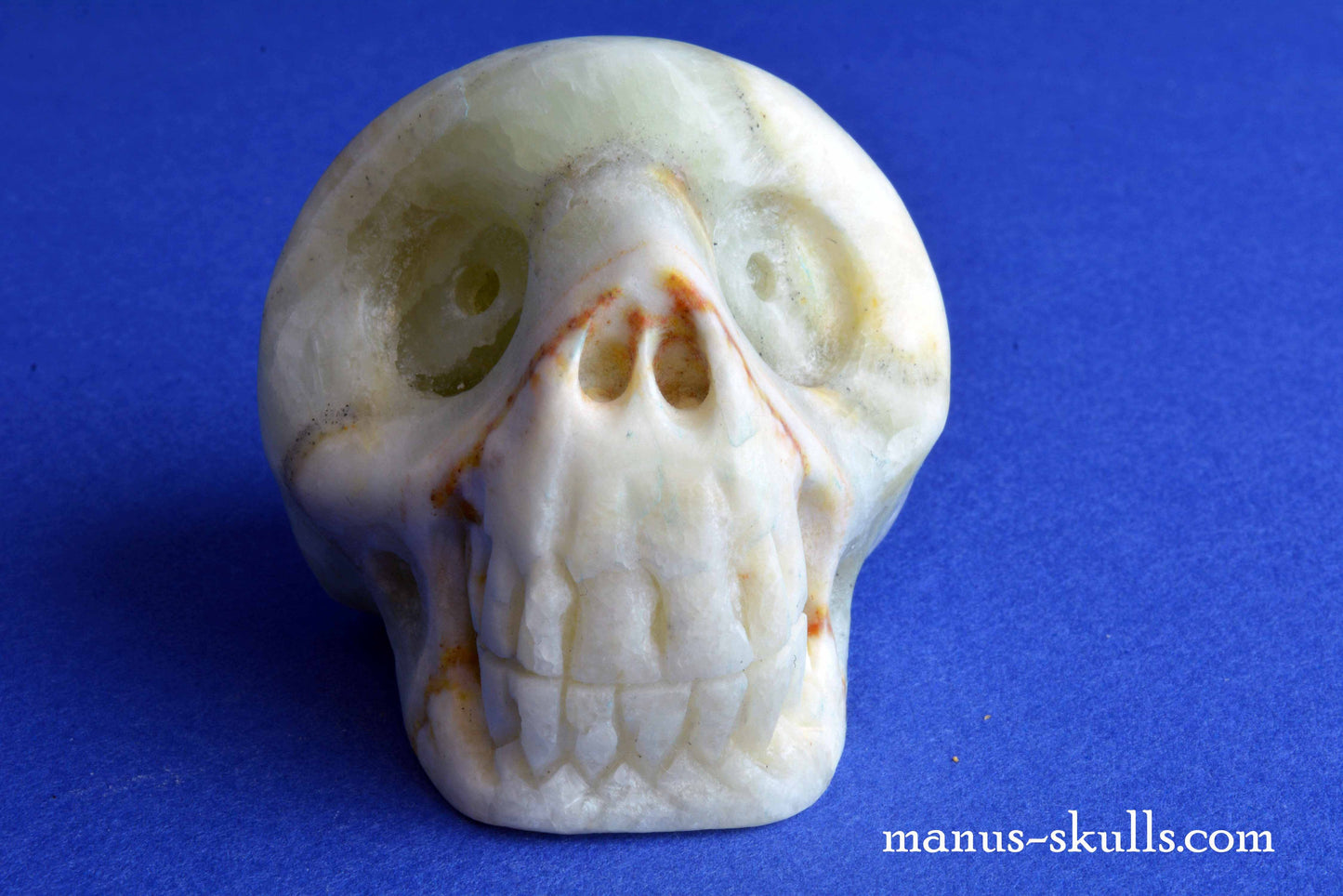 Rainbow Calcite Skull